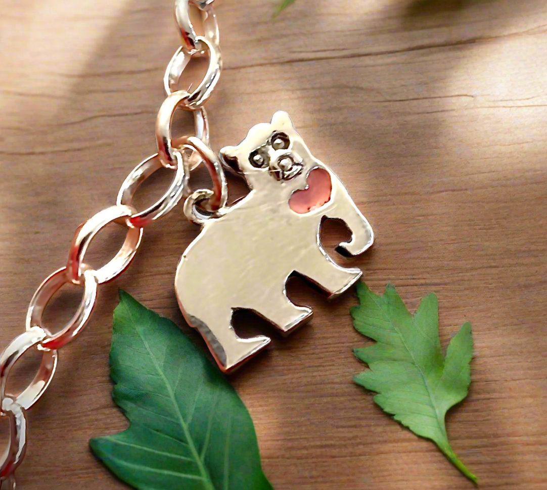 Free The Bears Charm Bracelet and Sun Bear Charm