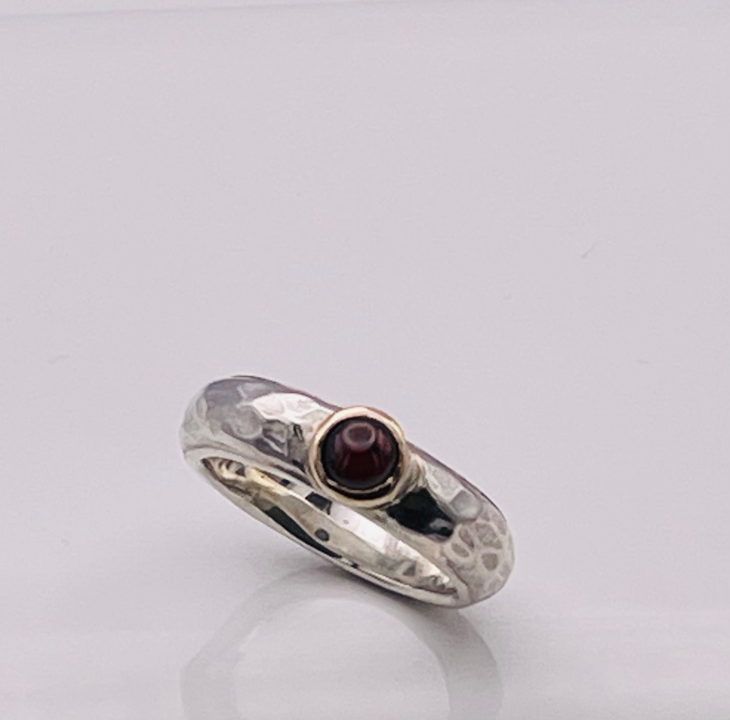 Cabochon Garnet, silver and gold ring