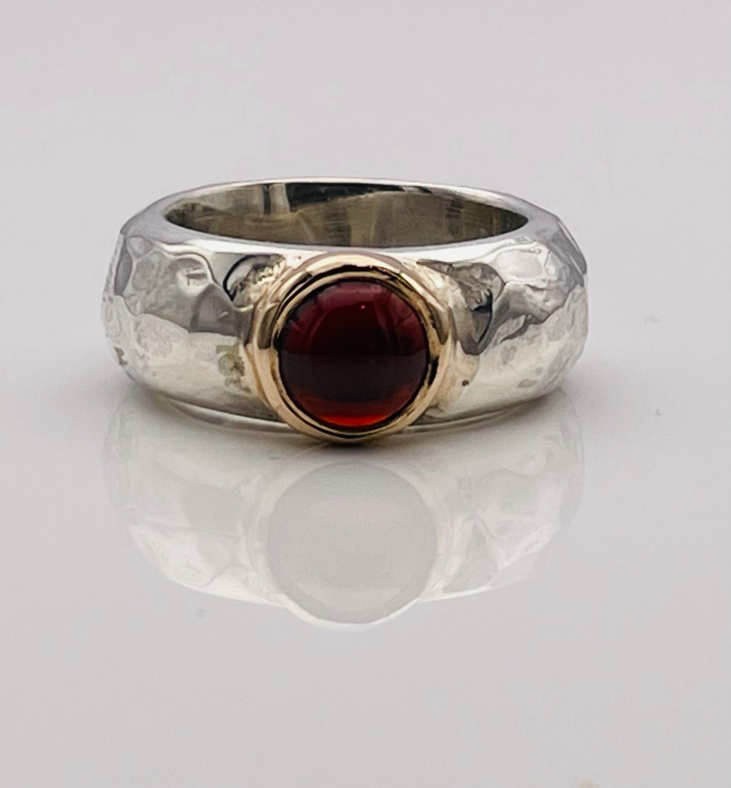 Cabochon Garnet, silver and gold ring