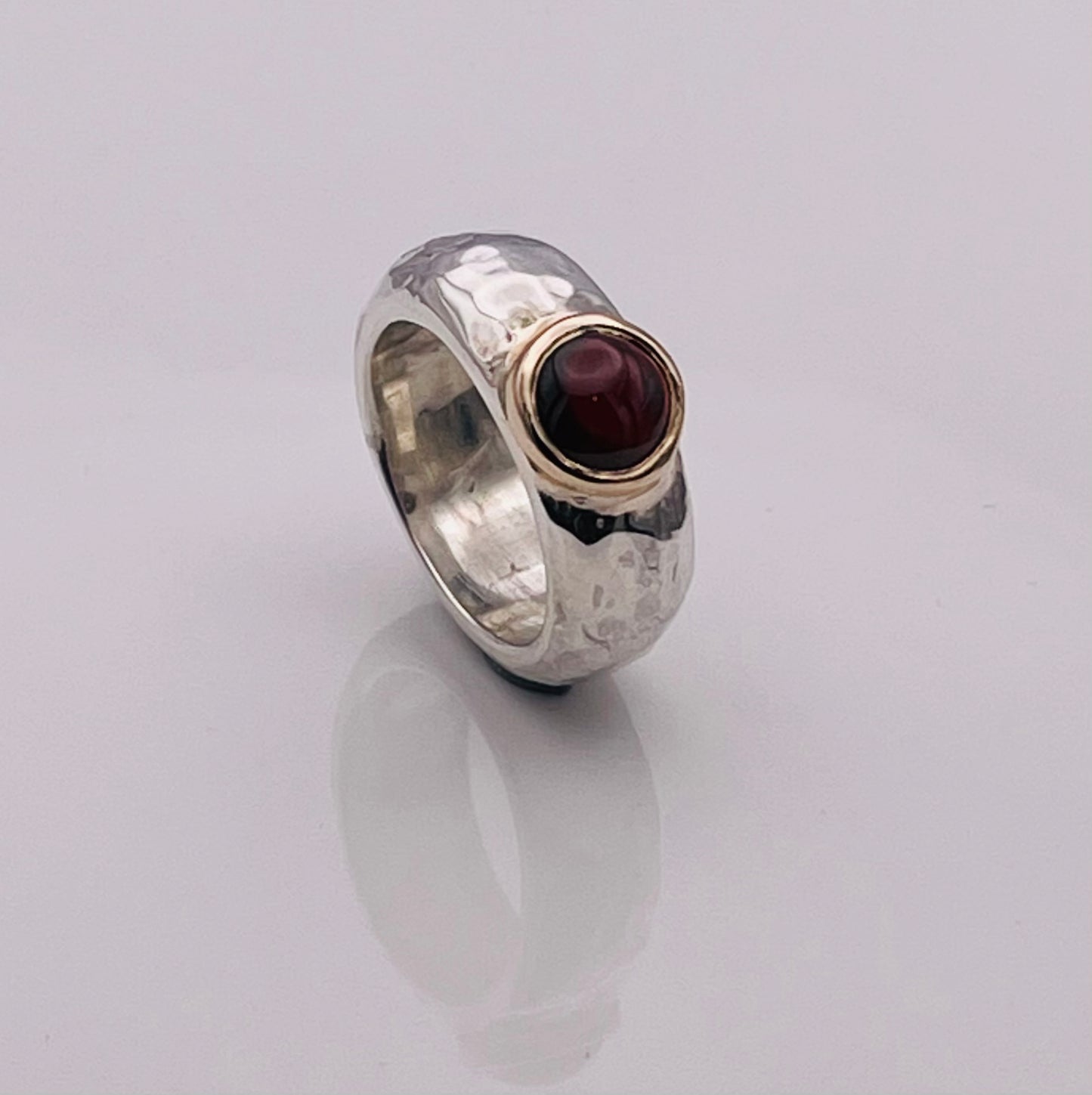 Cabochon Garnet, silver and gold ring