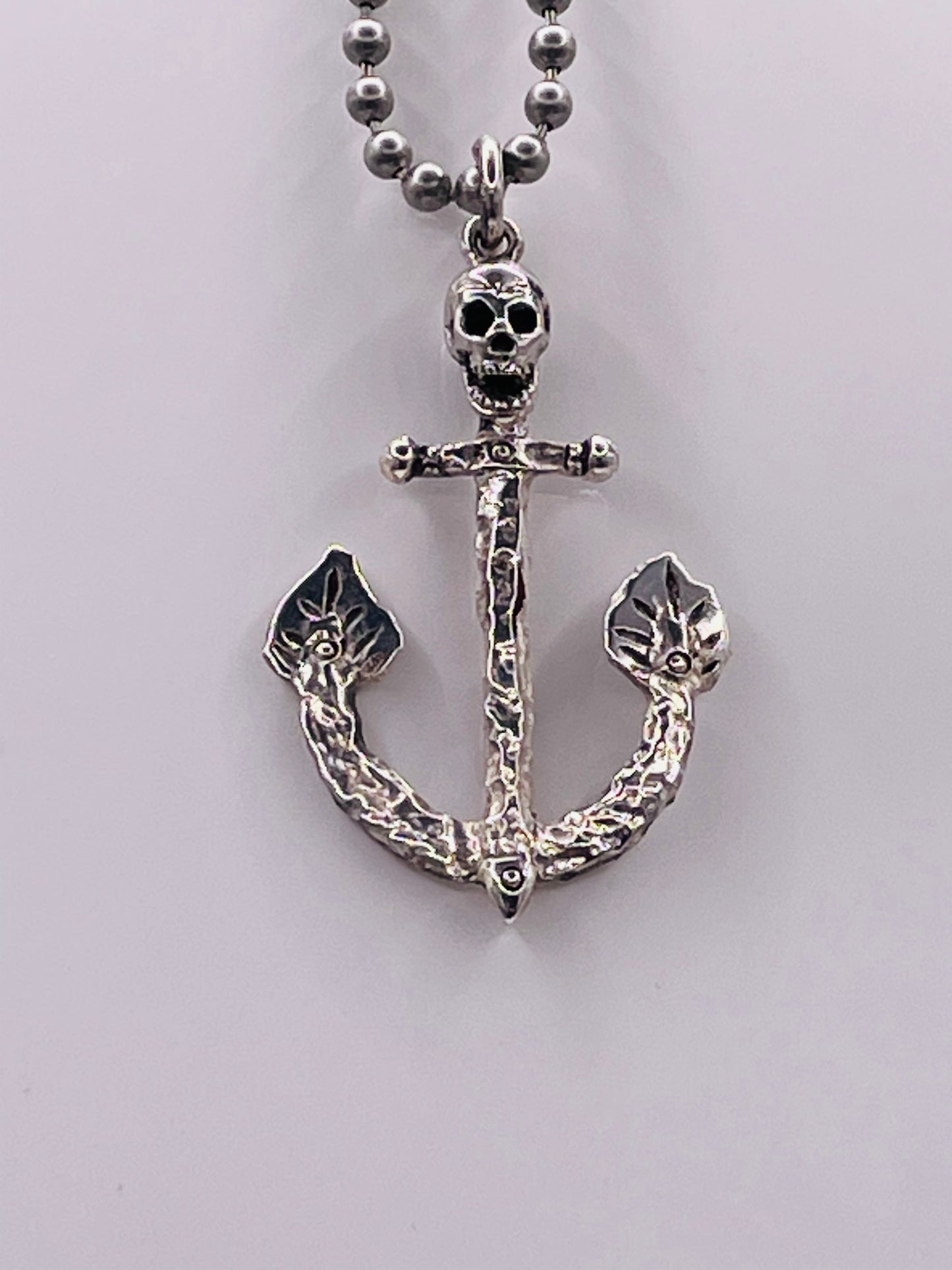 Anchor and skull pendant
