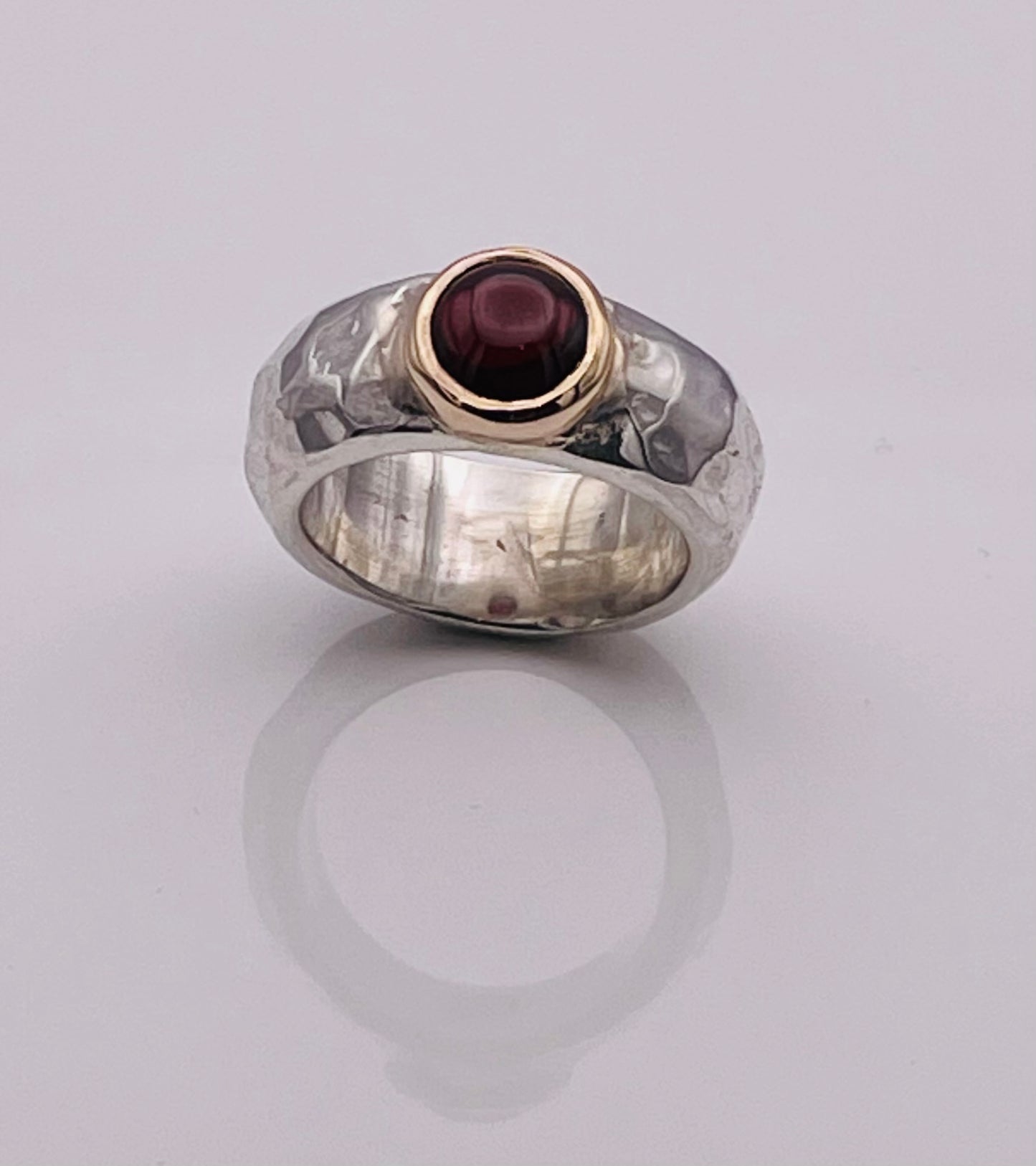 Cabochon Garnet, silver and gold ring